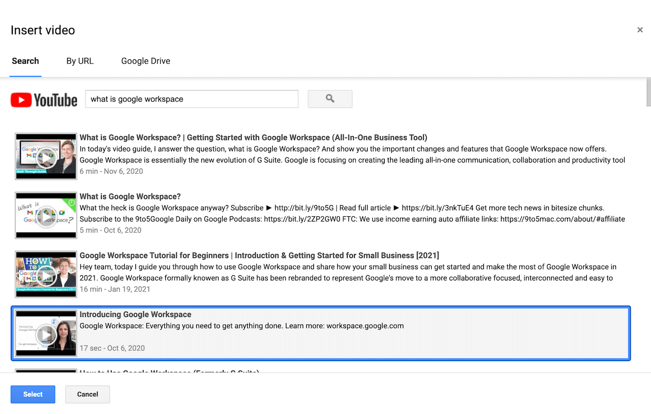 Google Slides Insert video dialog showing YouTube search results for What is Google Workspace
