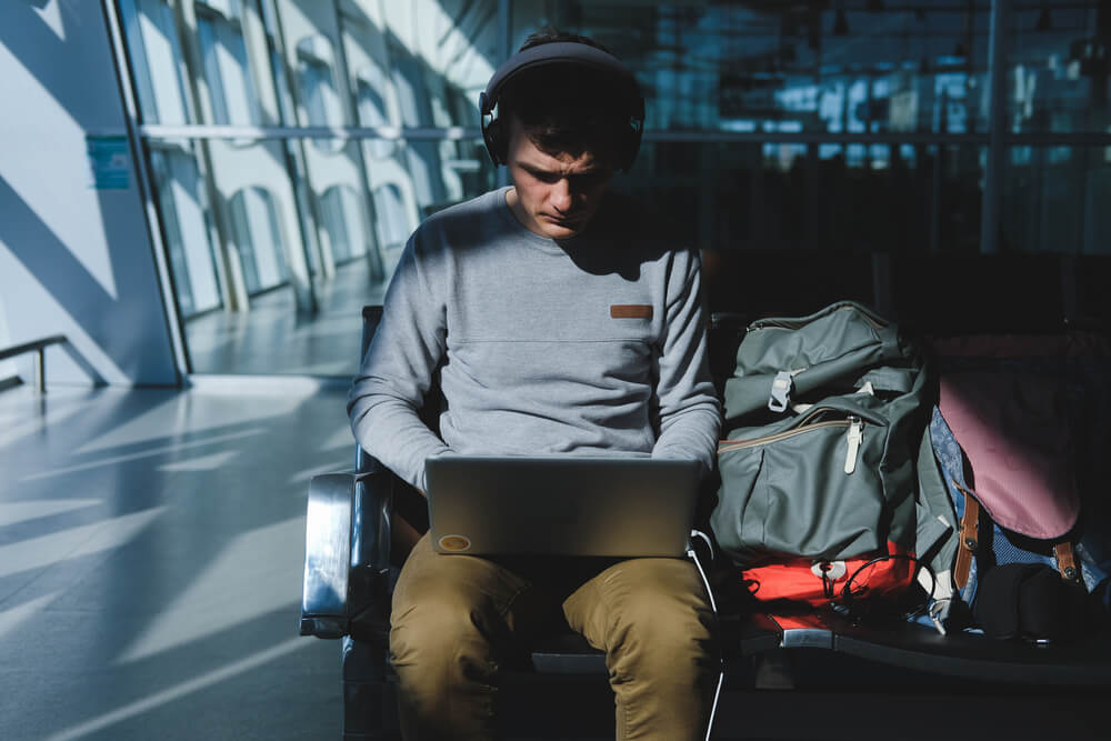 Businessman With Laptop Headphones